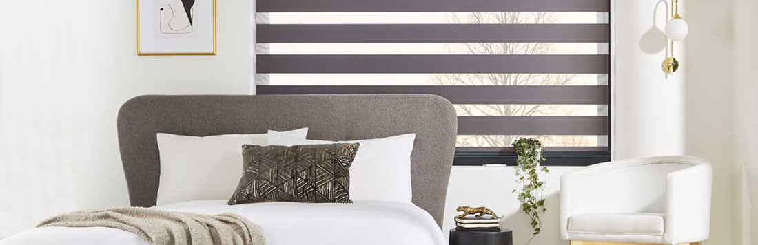 Stylish day and night blinds in a modern bedroom, providing light filtration and privacy.