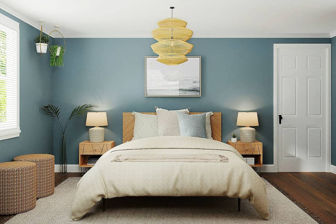 Modern bedroom featuring a blue accent wall, cozy decor, and stylish lighting, ideal for evaluating bedroom blinds.